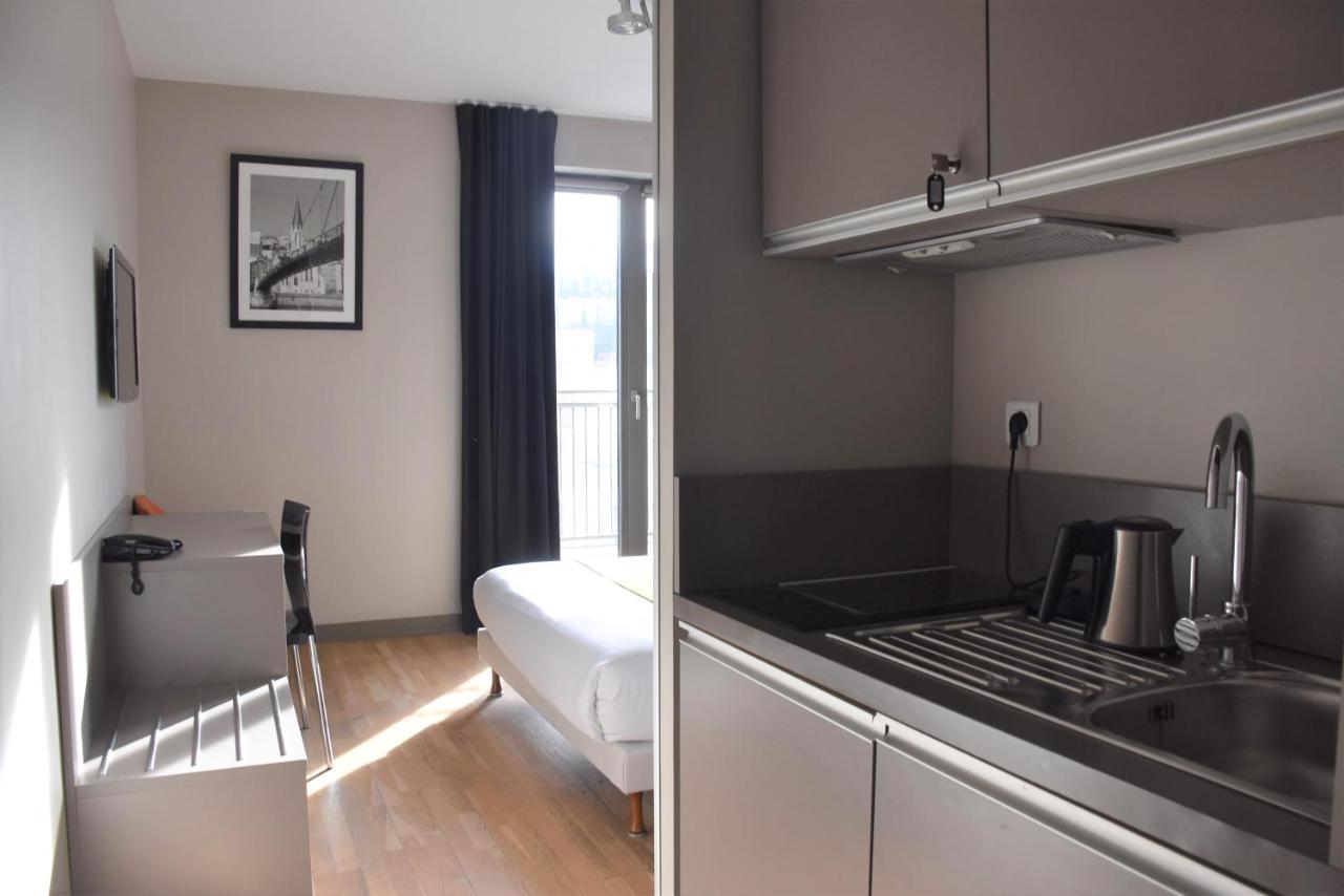 Aparthotel Adonis Lyon Dock Ouest Esterno foto