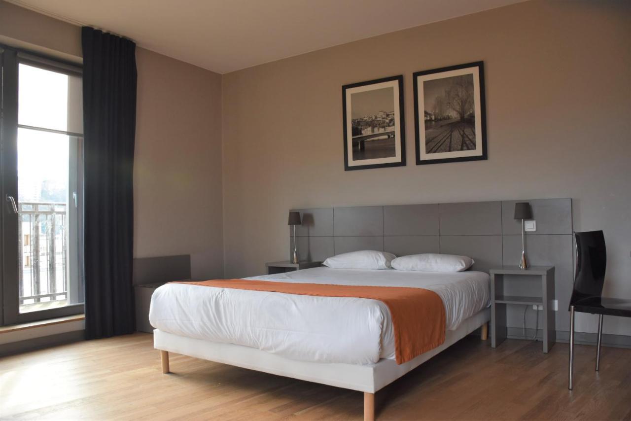 Aparthotel Adonis Lyon Dock Ouest Esterno foto
