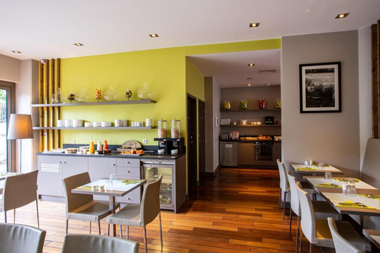 Aparthotel Adonis Lyon Dock Ouest Esterno foto